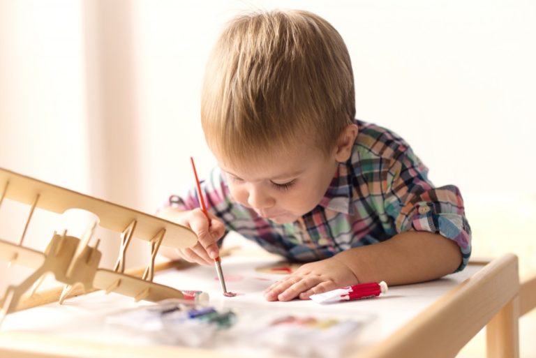 a child doing arts and crafts