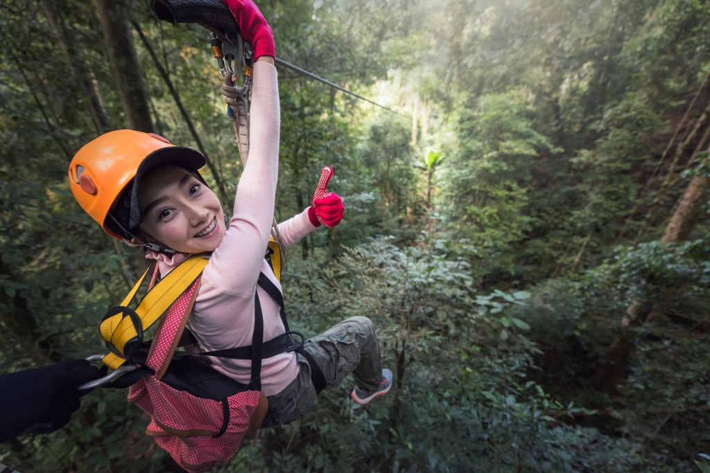 a woman at a zipline