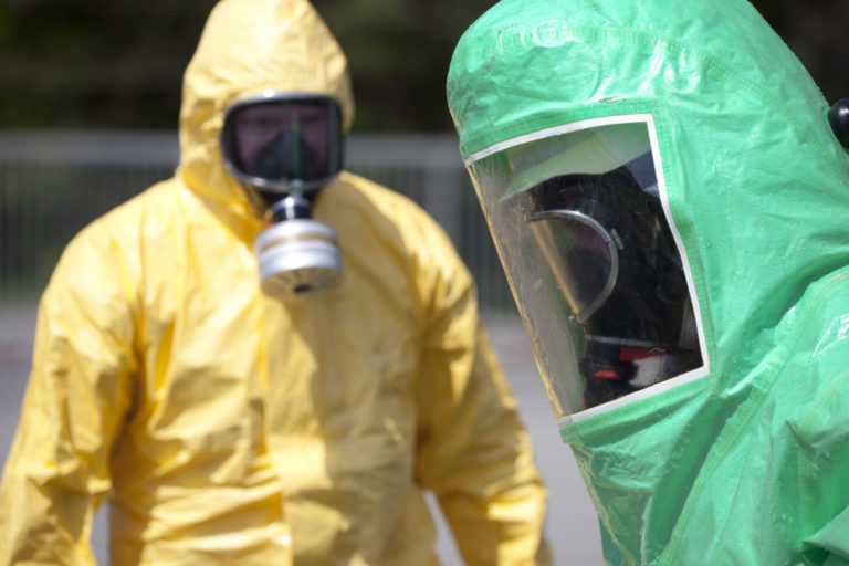 people in hazmat suits