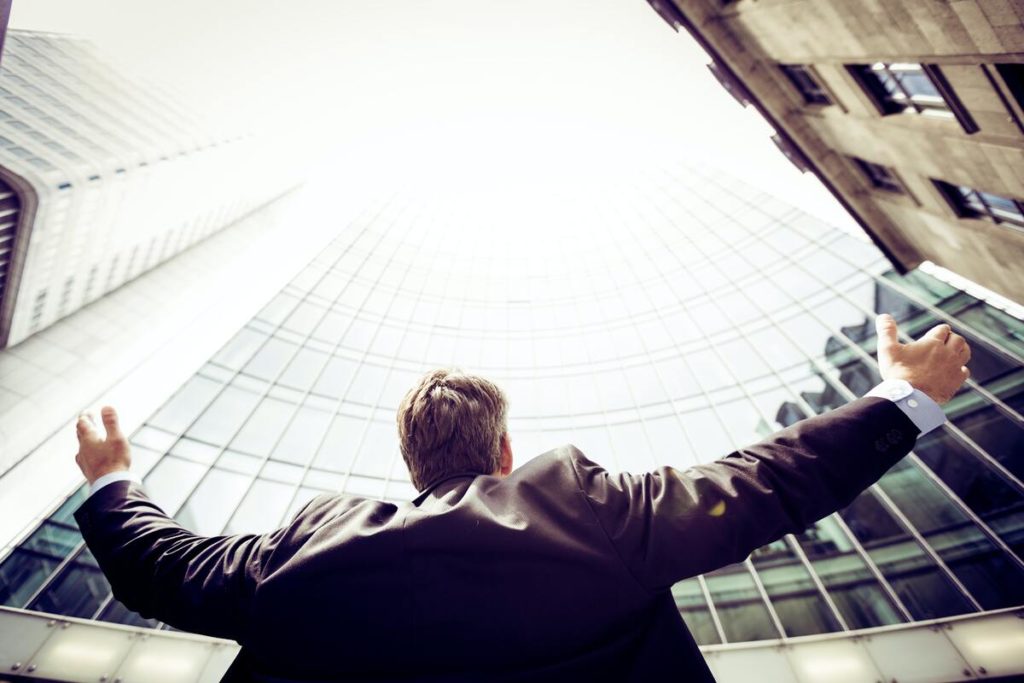 man between buildings