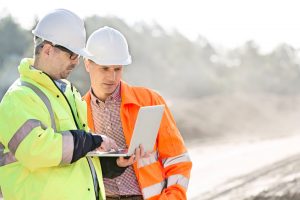 construction manager discussing something over a laptop