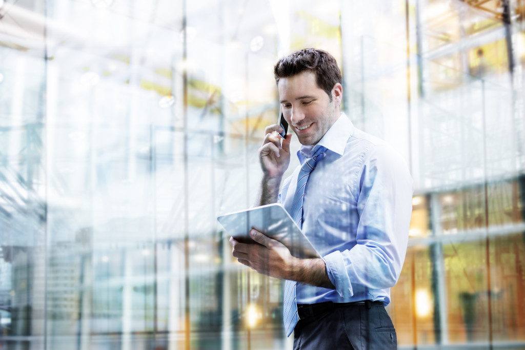 businessman maximizing technology