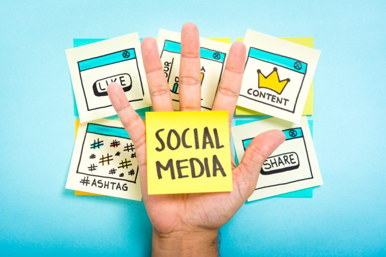 Social media on hand with blue background