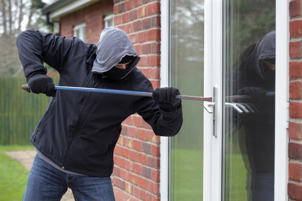 A man breaking into office