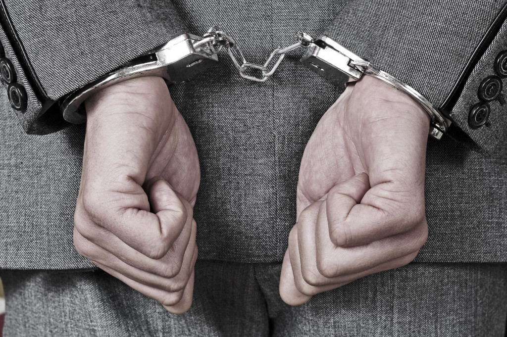 Handcuffs arrested because of fraud