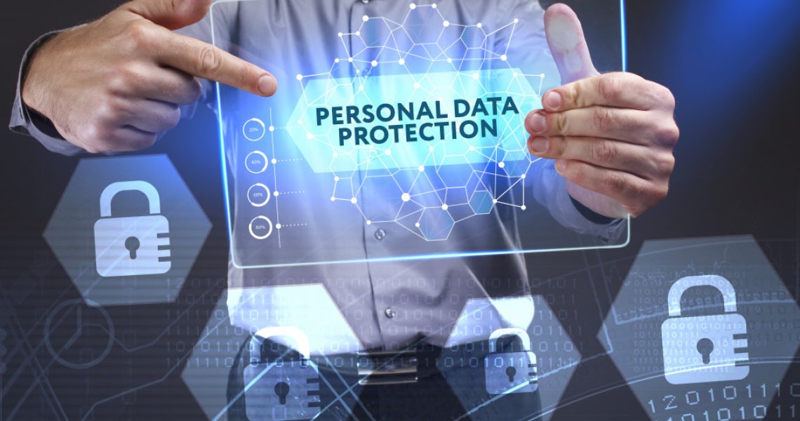 man holding digital data security on a mdoern tablet