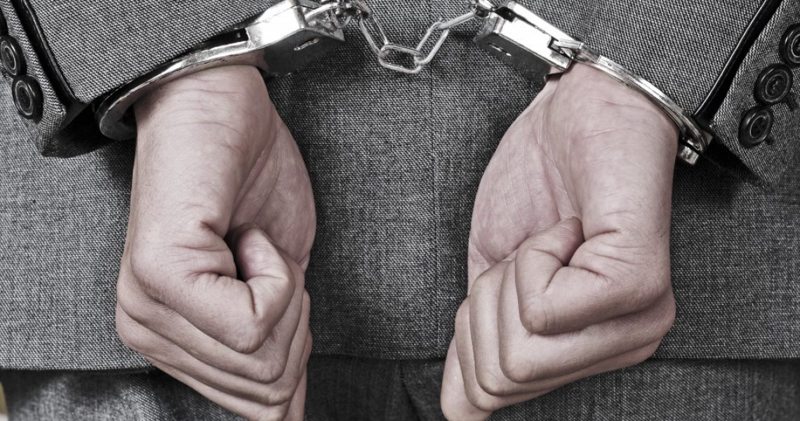 Handcuffs arrested because of fraud